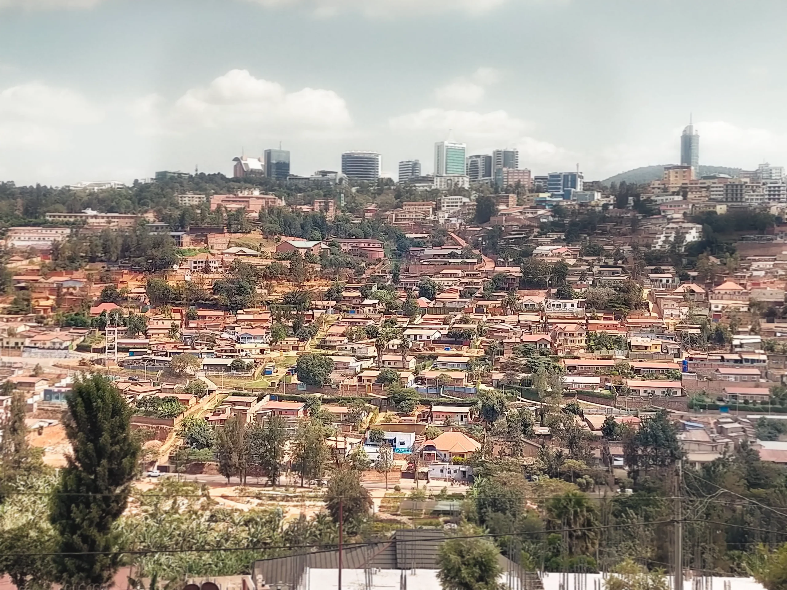 Aerial view of Kigali city, Rwanda, showing urban density and hilly topography.