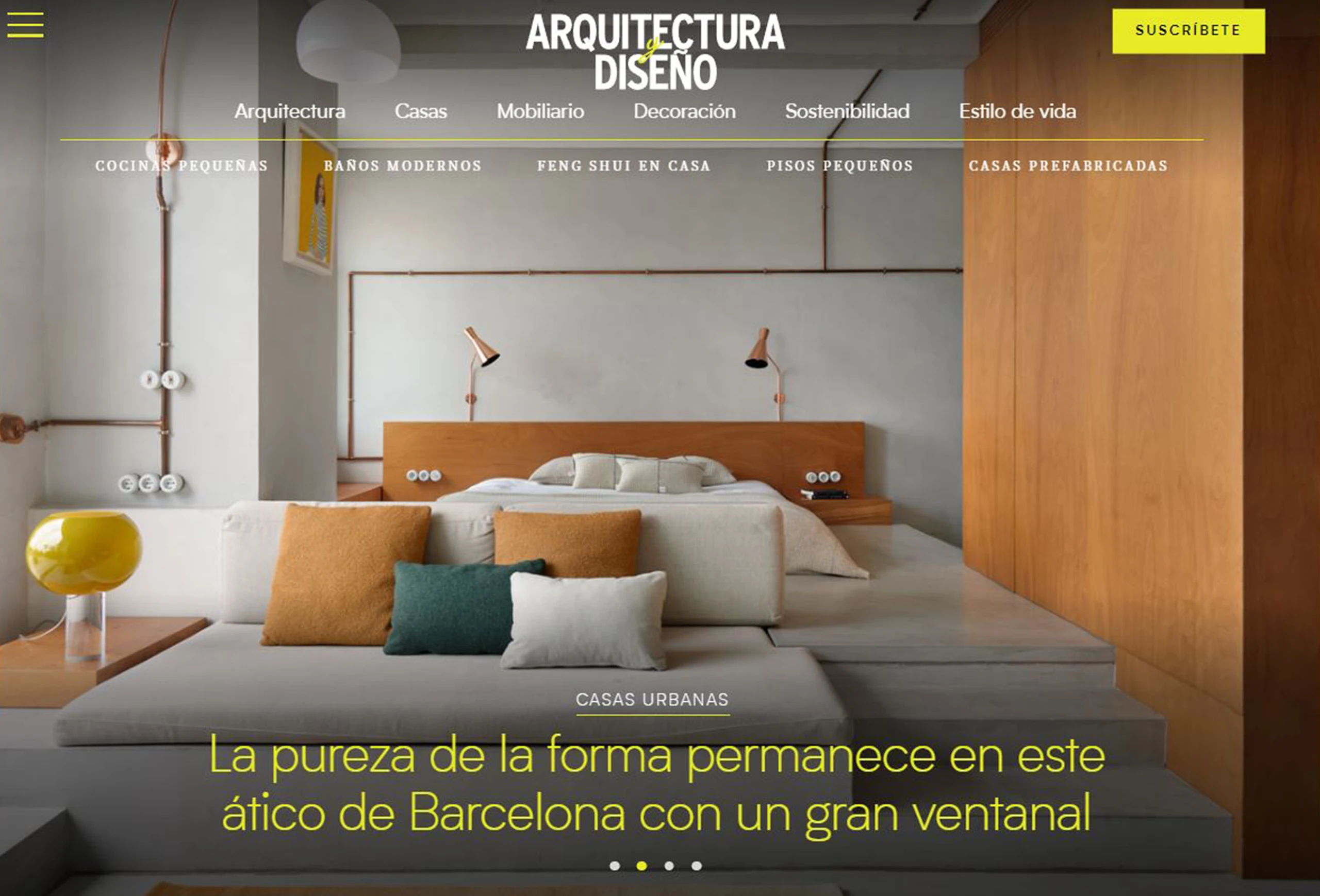 Interior of Marina Apartment by Cometa Architects in Barcelona featuring a raised concrete platform bed, wood paneling, and exposed copper piping.