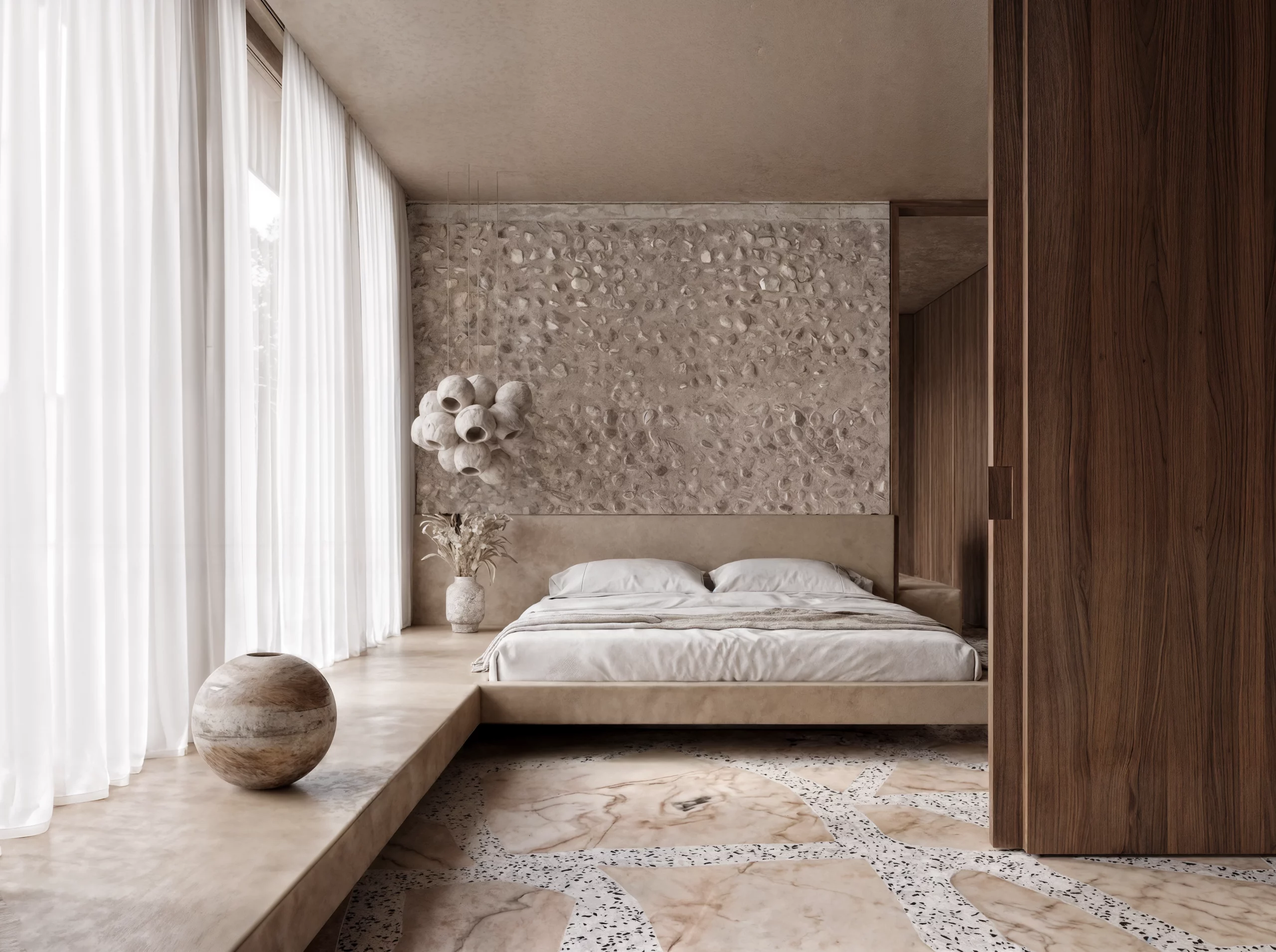 Bedroom interior at Salt d’Aigua by COMETA Architects, featuring local stone terrazzo flooring, an exposed aggregate wall, dark timber joinery and soft natural light in Port d’Andratx, Mallorca.