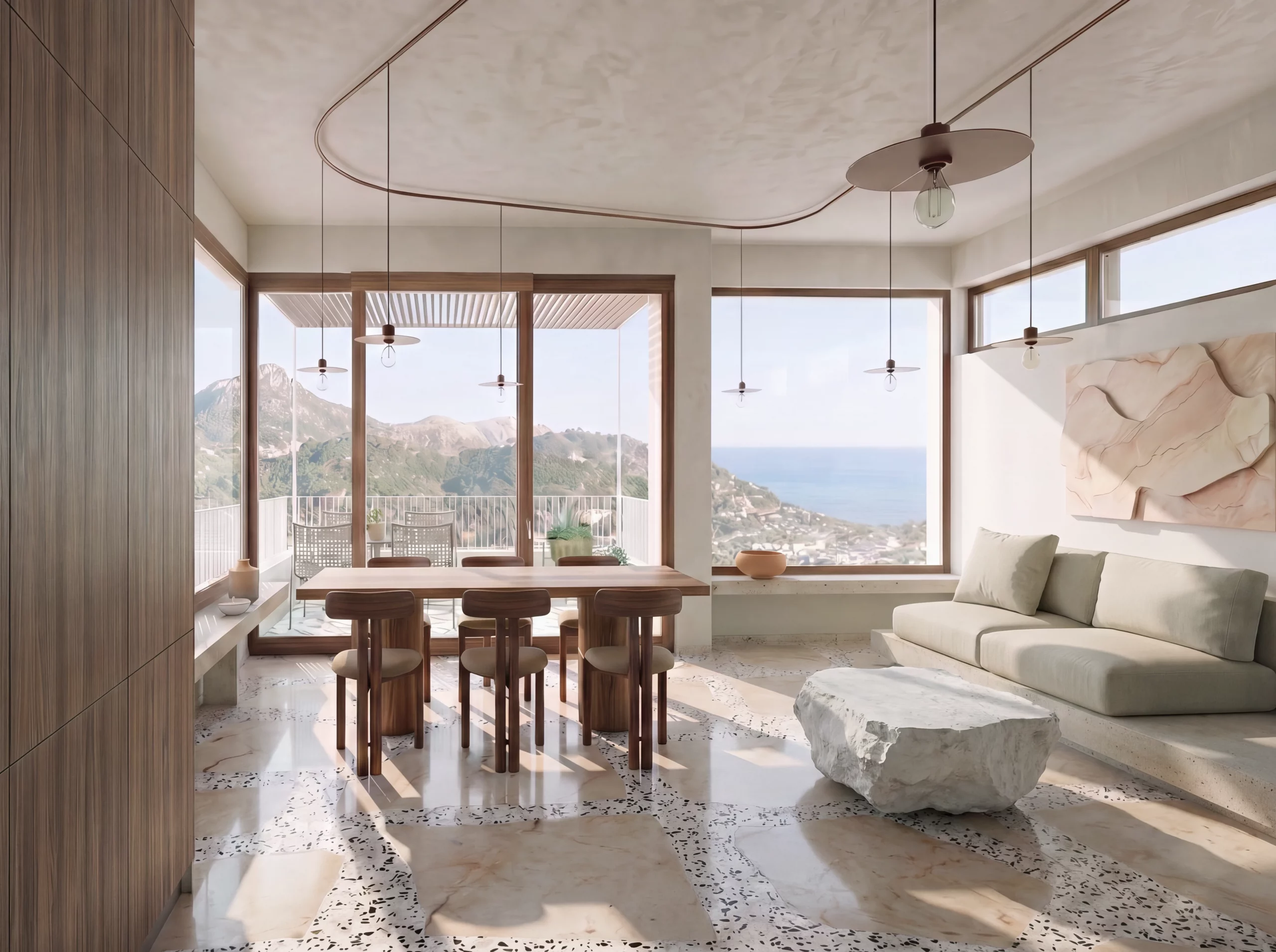 Living and dining interior at Salt d’Aigua by COMETA Architects, featuring custom timber furniture, local stone terrazzo flooring, suspended lighting and panoramic sea views in Port d’Andratx, Mallorca.